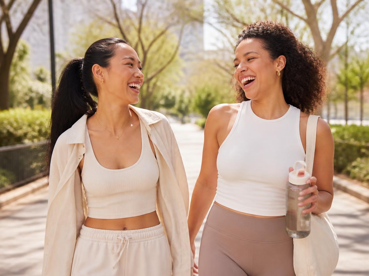 Two BringRx members walking outdoors